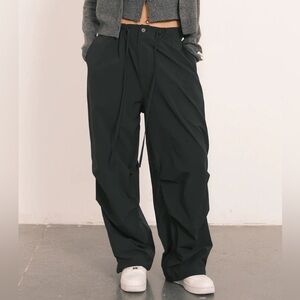 An Action A Day Fleece Lined Parachute Outdoor Pants